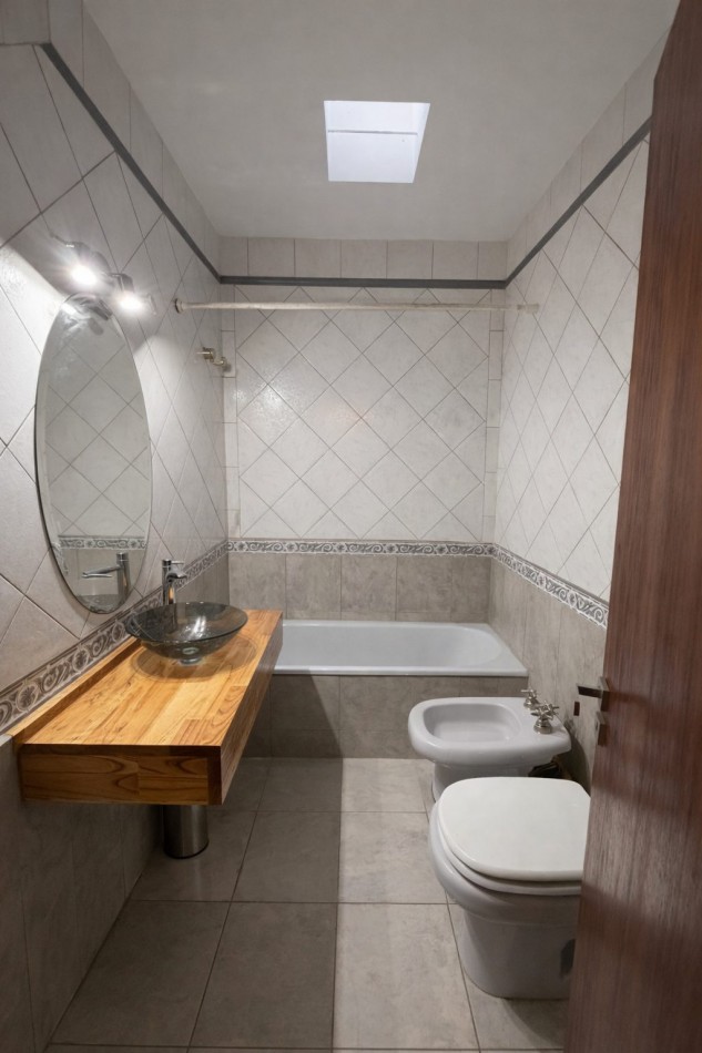 VENTA-CASA-CHUBUT 6700-3 DORMITORIOS-COCHERA-JARDIN